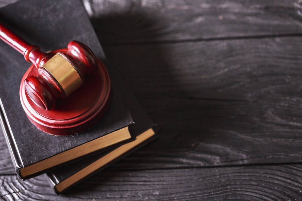 Gavel on Top of Books