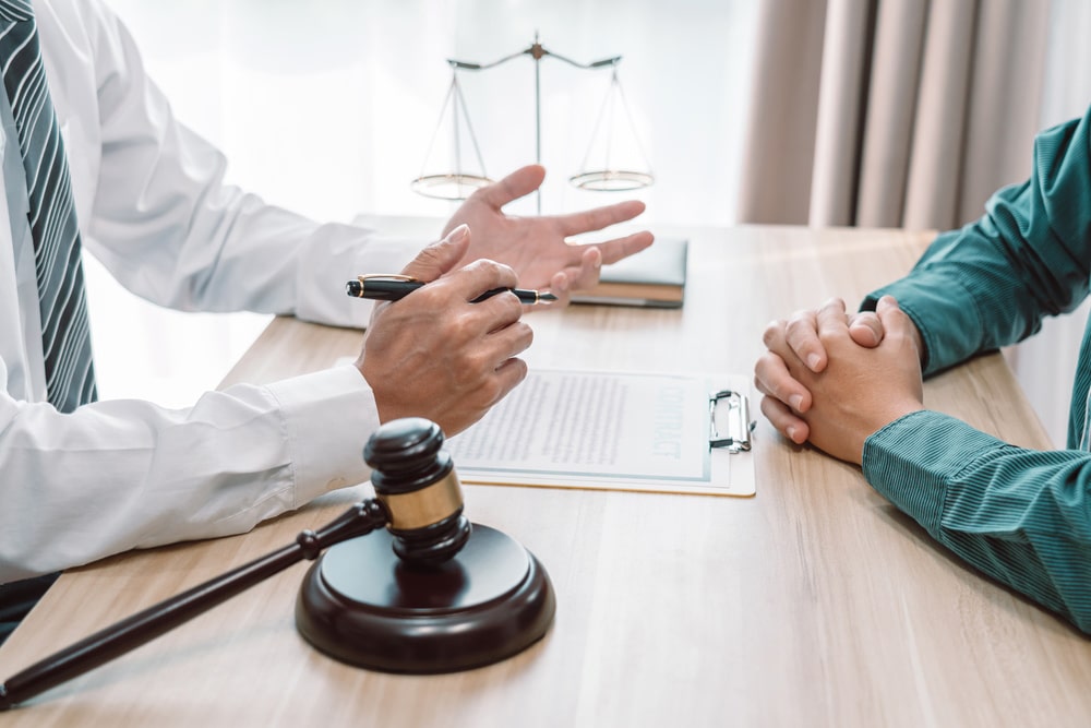 Lawyer Talking to A Client